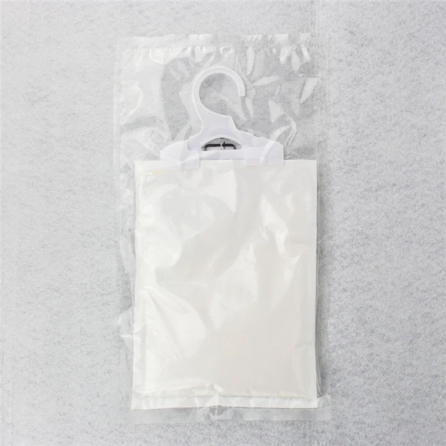 Kalcio chlorido drėgmės absorberio maišelis .jpg Calcium chloride moisture absorber bag .jpg
