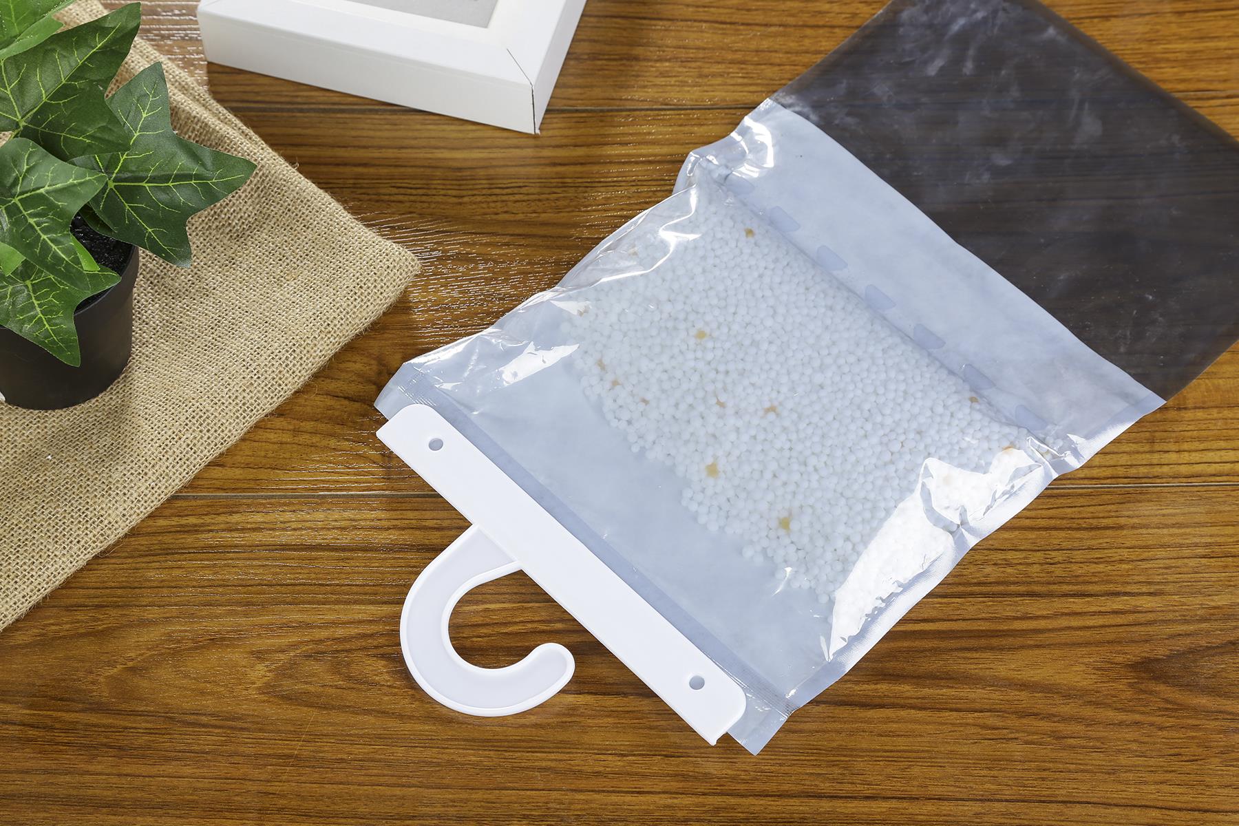 Pakabinama spinta Higroskopinis prieš pelėsį skystinantis tirpalas Bag.jpg Hanging Wardrobe Hygroscopic Anti-mold Desiccant Bag.jpg